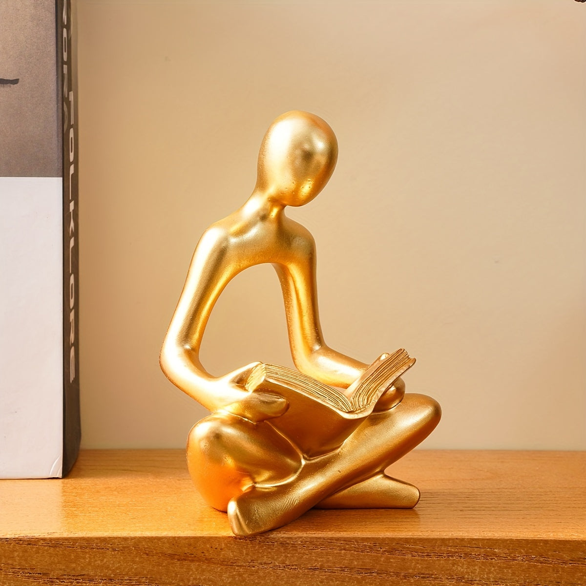 Charmante figurine en résine représentant un amoureux des livres – Disponible en noir, blanc et doré – Parfaite pour la décoration de la maison et de la salle à manger, les fêtes et les vacances
