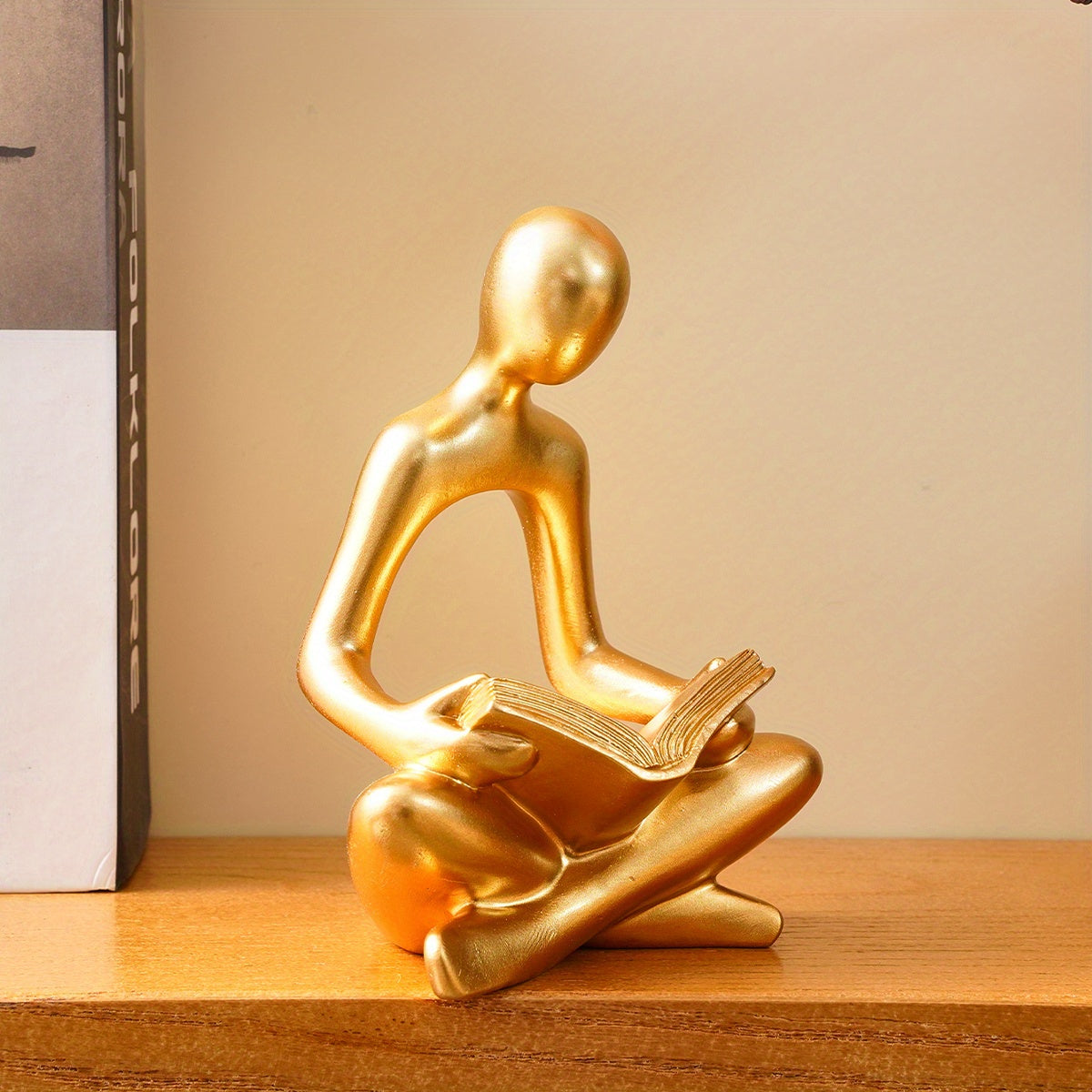 Charmante figurine en résine représentant un amoureux des livres – Disponible en noir, blanc et doré – Parfaite pour la décoration de la maison et de la salle à manger, les fêtes et les vacances
